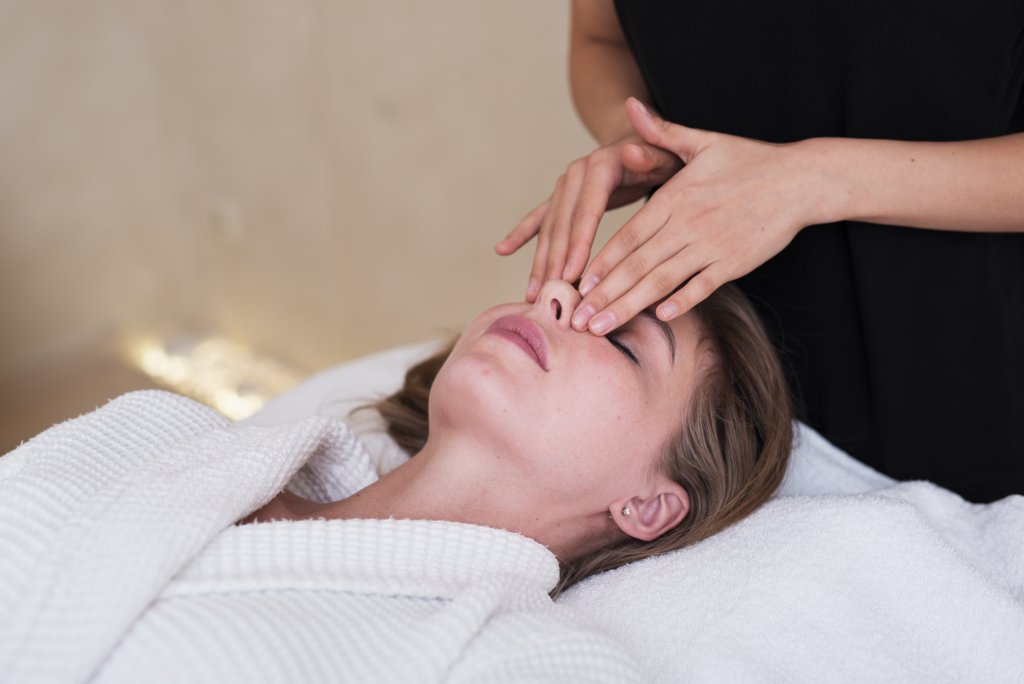 relaxed-woman-getting-a-facial-massage.jpg