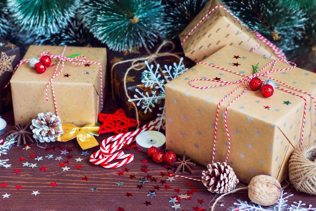 christmas-holiday-gift-box-decorated-festive-table-with-pine-cones-fir-branches.jpg